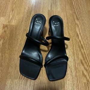 Size 6.5, slip on wedge heel. Worn 1 time.